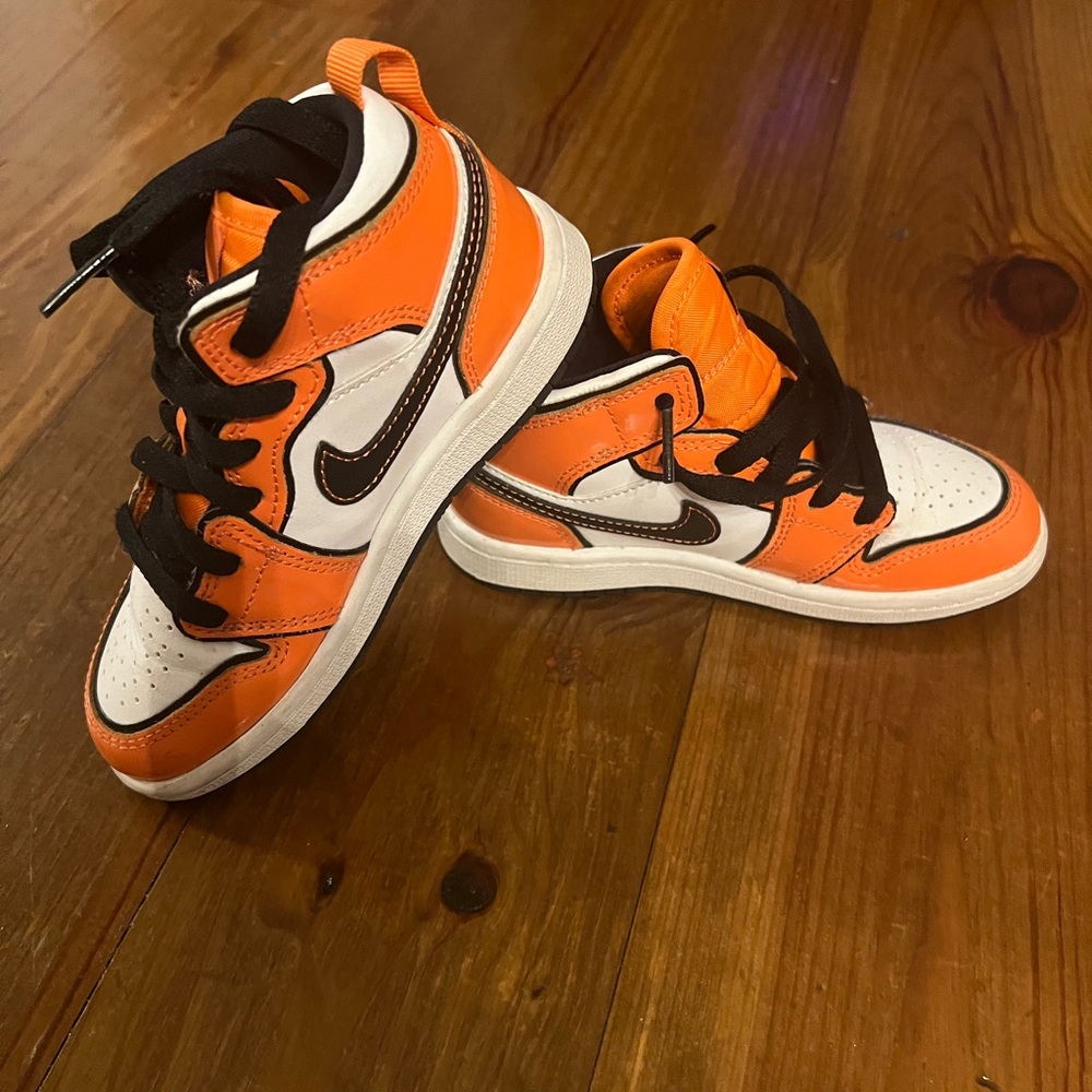 Nike Kids' Vibrant Orange and Black Sneakers